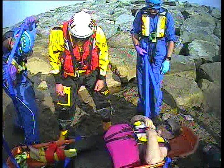 Evacuation of injured woman